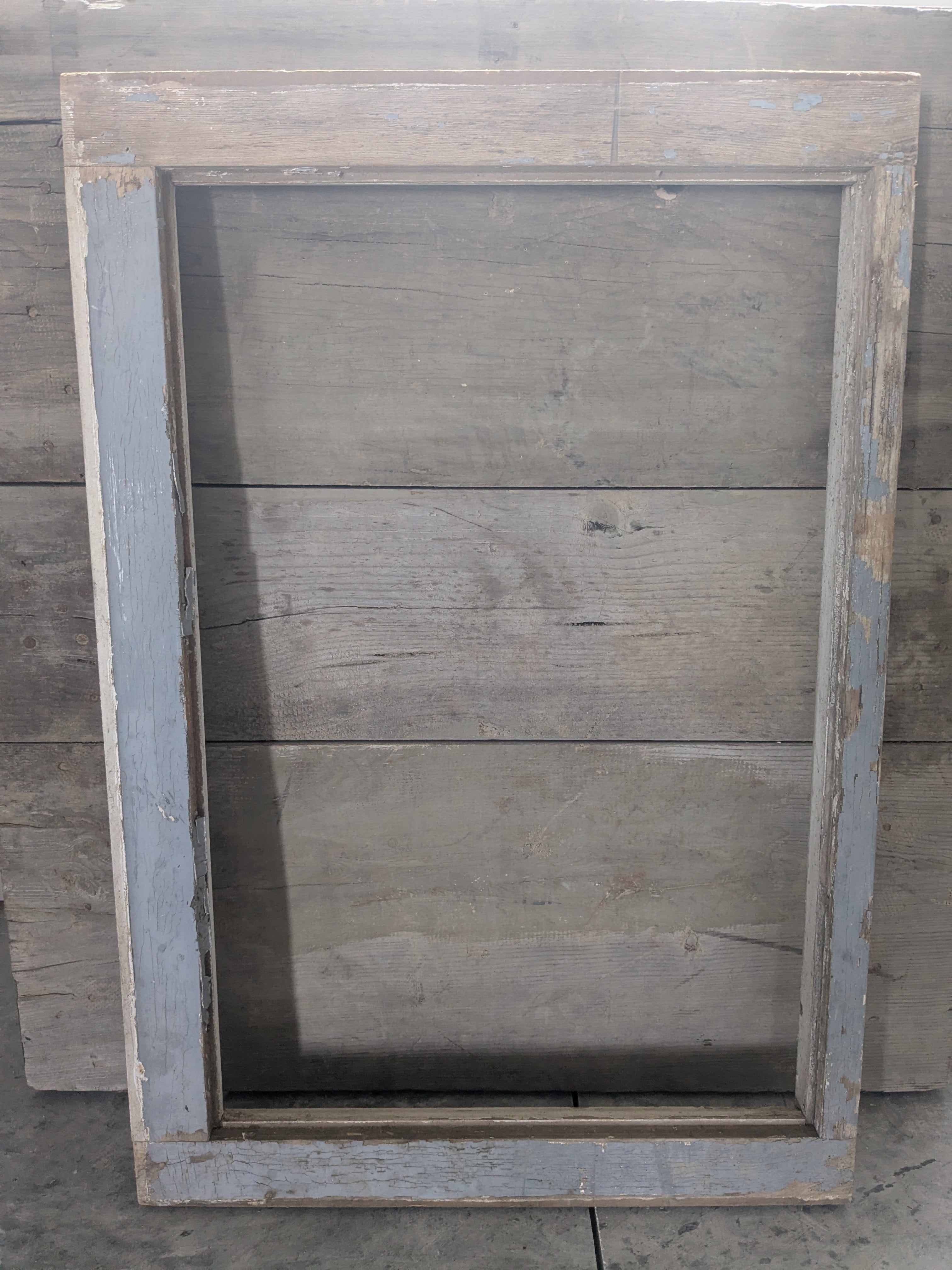 Heritage Blue Painted Window Frame with preserved character and authentic patina by Restoration Hardwood. wood