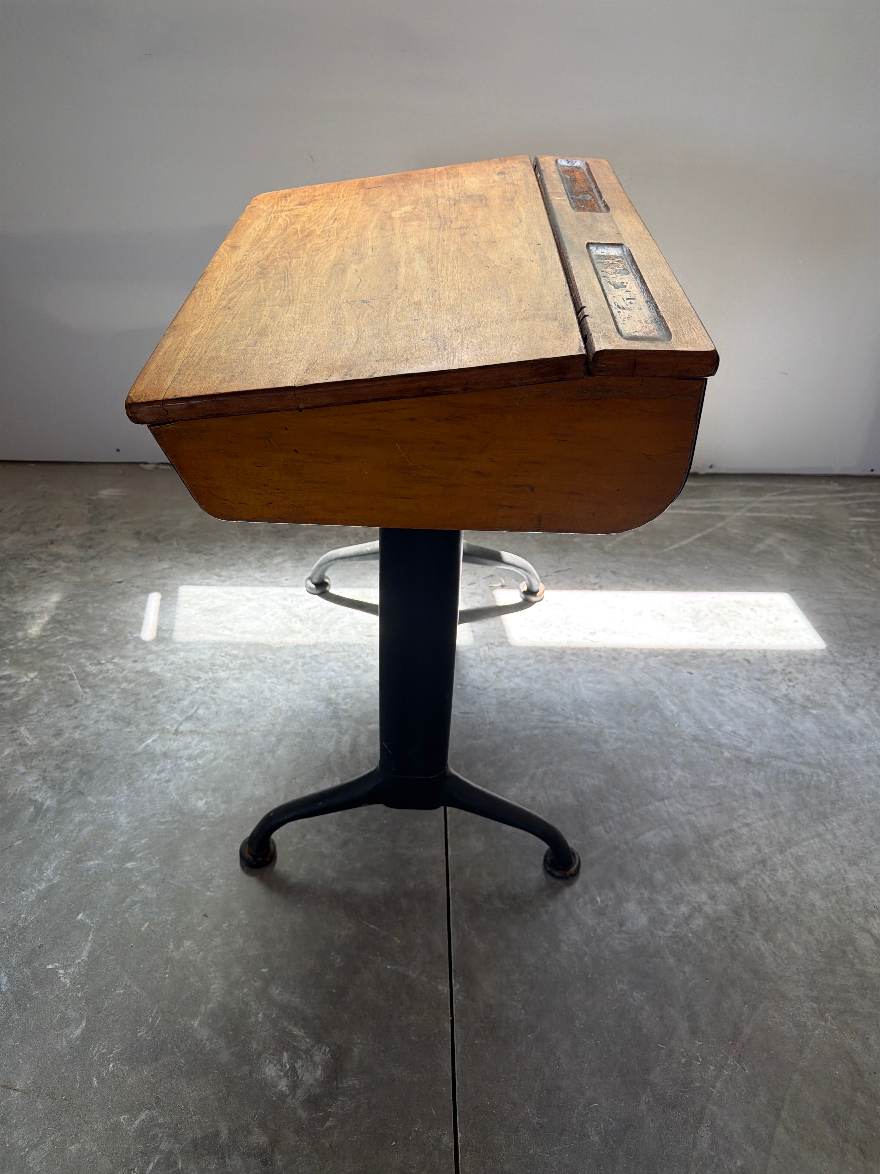 Heritage schoolhouse desk with compact workstation form and preserved RHW character
